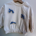 Pull léger à boucles H&M 1 1/2-2 ans  | Seconde main (Mini imperfection*)